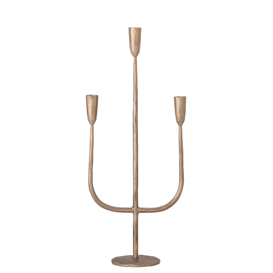 The Ace Candle Holder by Bloomingville is an elegant candle holder made of brass metal and has three arms.