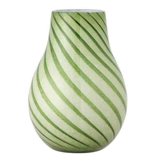 The Leona Vase by Bloomingville is a unique mouth-blown vase in a beautiful greenish hue with striped effect. The vase is wider at the bottom and narrows towards the top, making it perfect for displaying flowers in a beautiful way