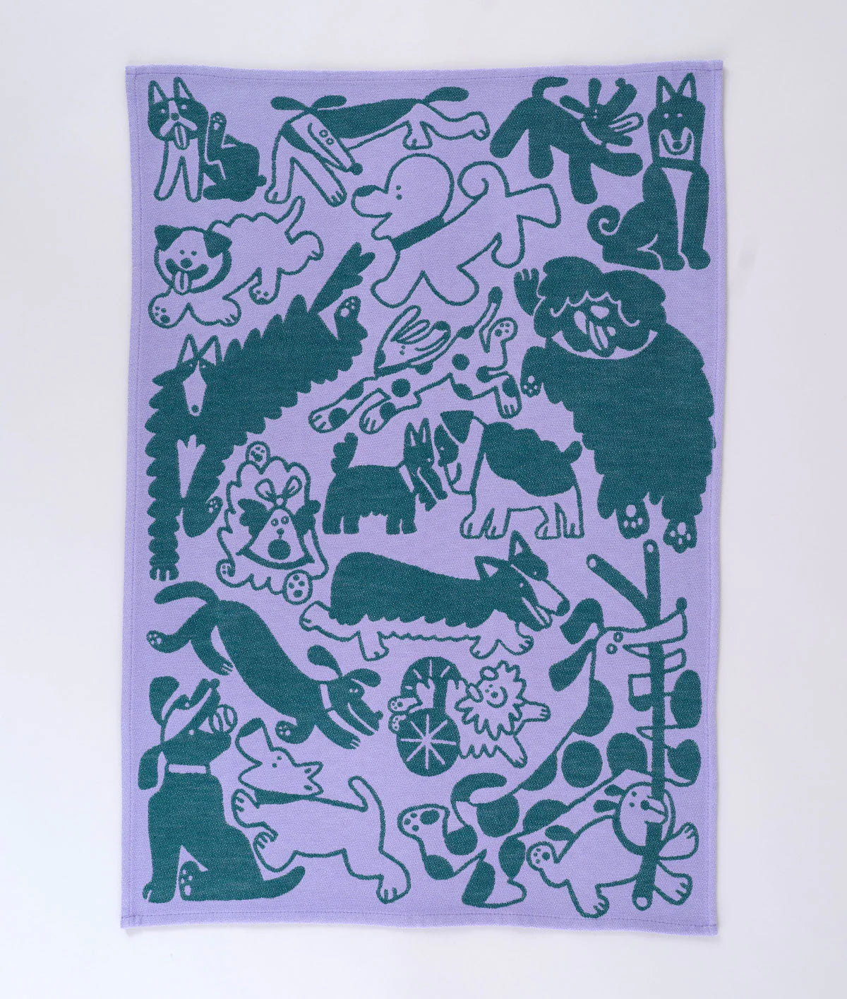 Fun and humorous, this design by Cari Vander Yacht comes in a colourful lilac and green colourway. Made with 100% woven cotton, the towels feature a posse of pooches who are just here to have fun.
