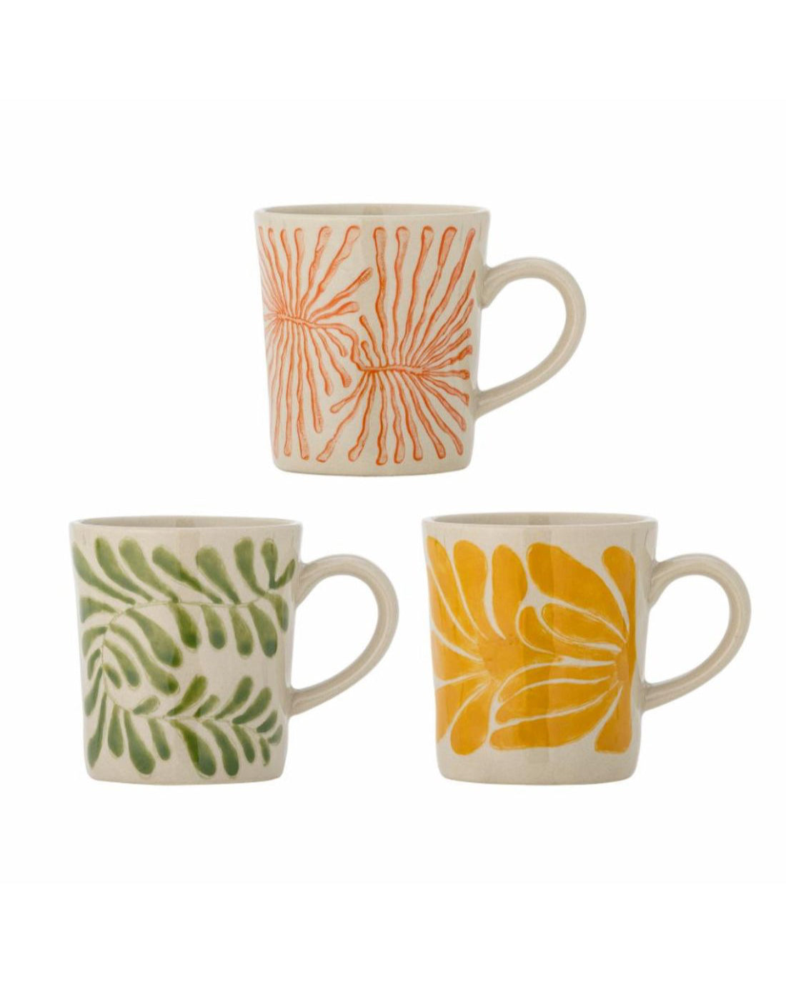 Set of three ceramic mugs with floral patterns on a white background