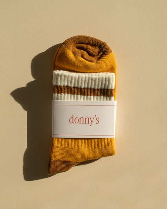 Folded donny's marigold sock in their packaging