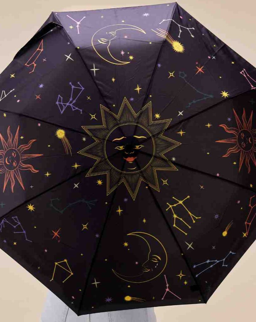 The Every Space handmade Zodiac, duck handled umbrellas, by Original Duckhead, are wind resistant with an automatic open button, and made from 100% recycled fabric and birch wood.