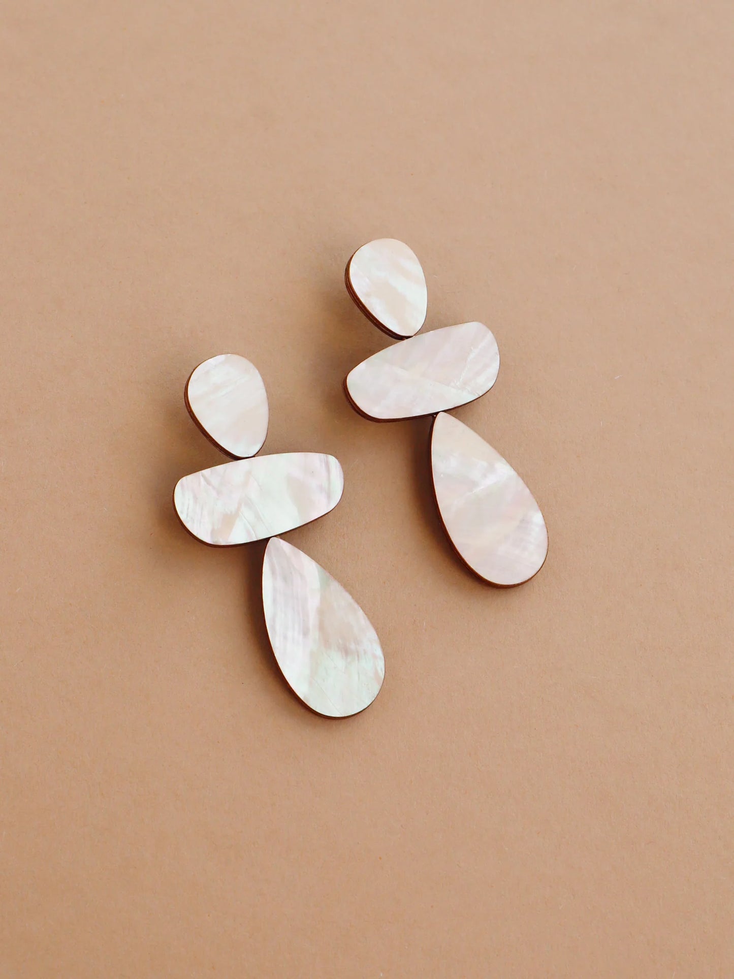 Th Every Space Ana earrings in cream mother of pearl veneer, wood and sterling silver by Wolf & Moon
