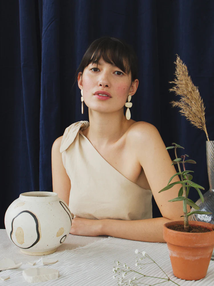 Th Every Space Ana earrings in cream mother of pearl veneer, wood and sterling silver by Wolf & Moon