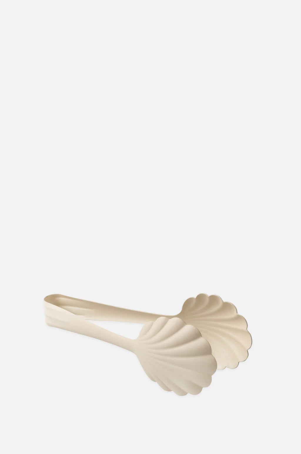 The Every Space scalloped, vintage creme Bread Tongs in stainless steel with a matt finish by Roger Orfevre