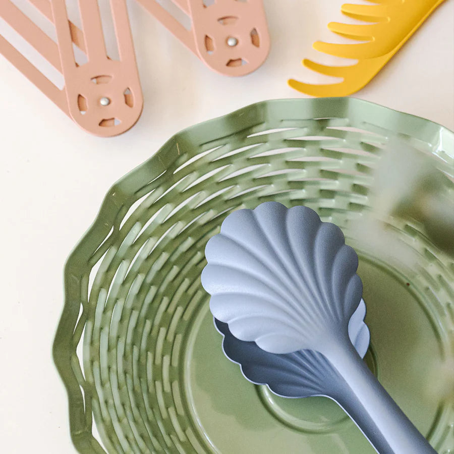The Every Space scalloped, vintage pastel blue Bread Tongs in stainless steel with a matt finish by Roger Orfevre