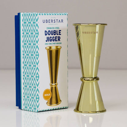 Single and double measure gold coloured cocktail jigger by Uberstar with blue and white box