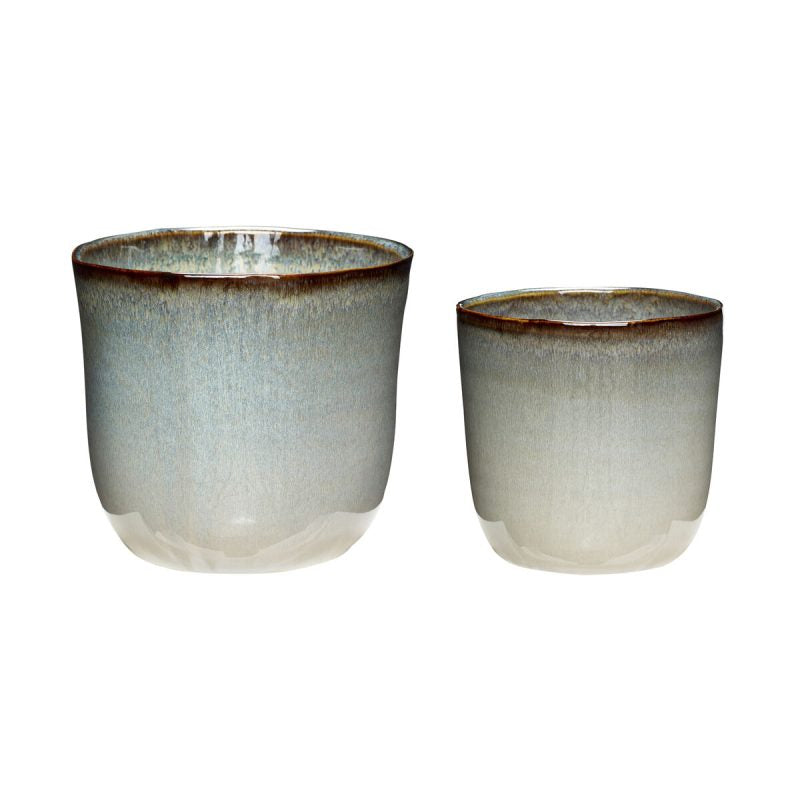 The Every Space ceramic indoor plant pots in blue and beige by Hübsch