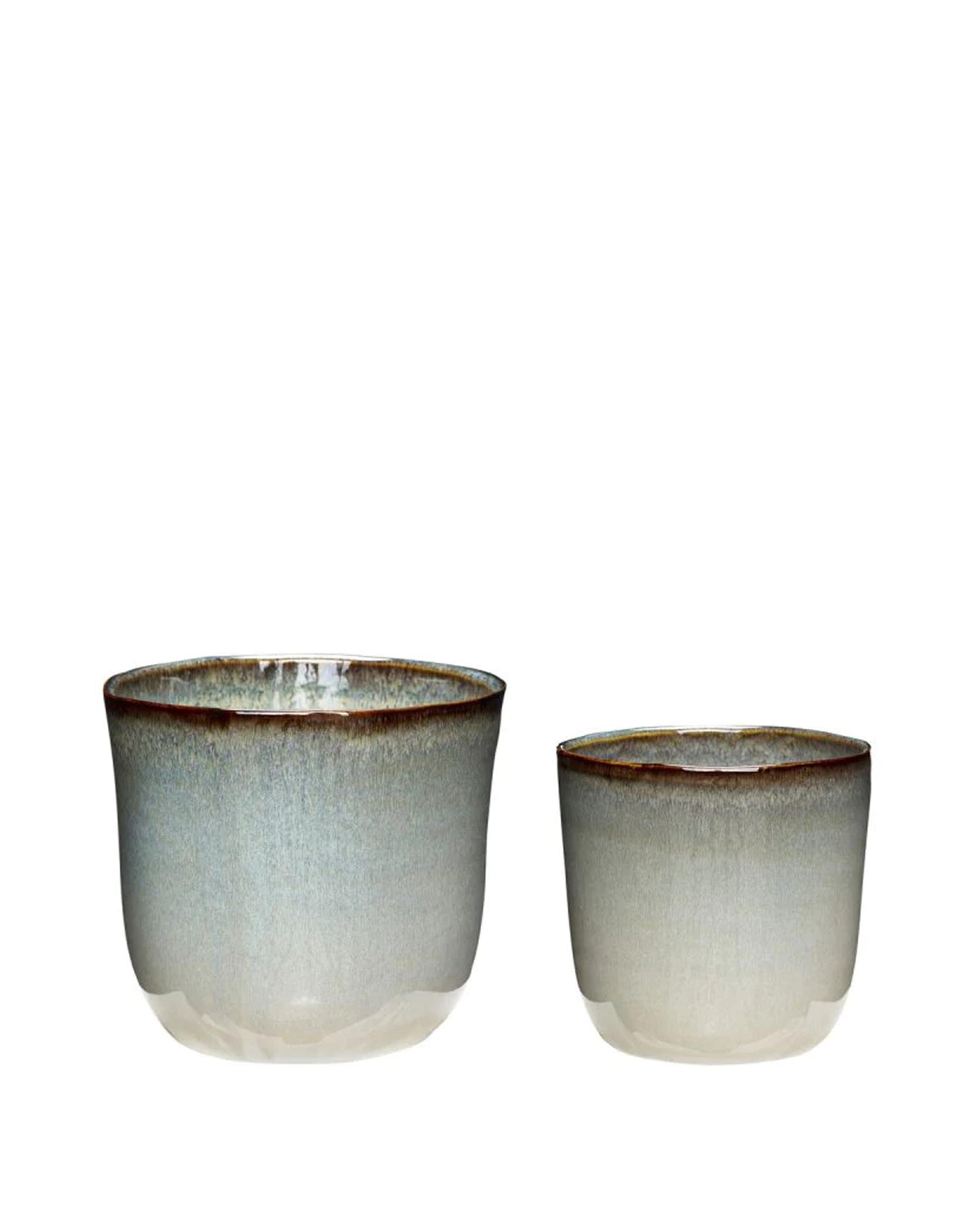 The Every Space ceramic indoor plant pots in blue and beige by Hübsch