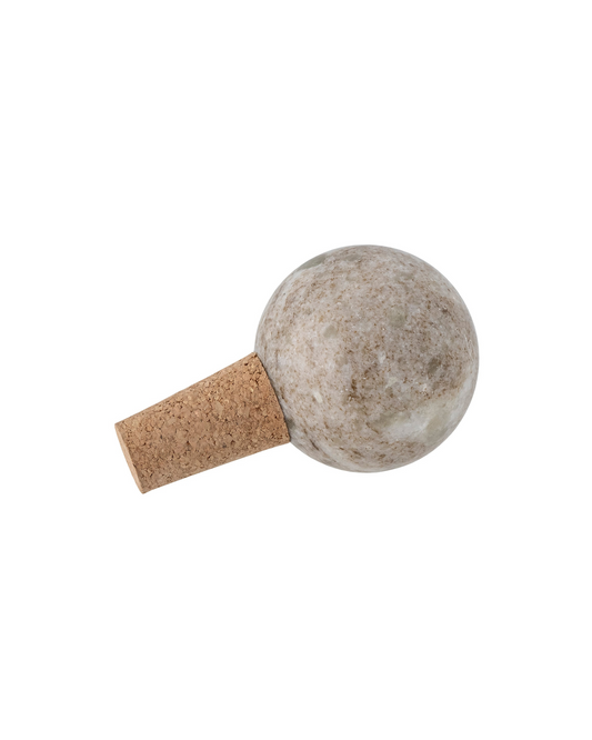 The Bernice Wine Stopper by Bloomingville is an elegant solution for keeping your wine fresh. With a cork stopper and a round top made of marble, it is both beautiful and functional.