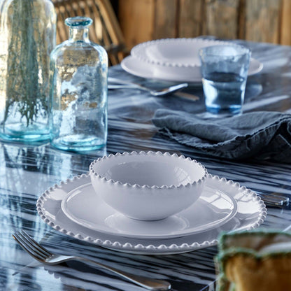 Exuding charm and elegance PEARL is a timeless collection inspired by the richness of 18th and 19th century European ceramics. The round shapes with a beaded rim are reinvented to create a new classic concept bringing a sophisticated and soft backdrop to your everyday table or setting the stage for all special celebrations