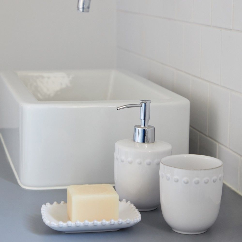The Every Space white, fine stoneware soapdish with pearl style edging detail for your bath or wash hand basin, by Costa Nova