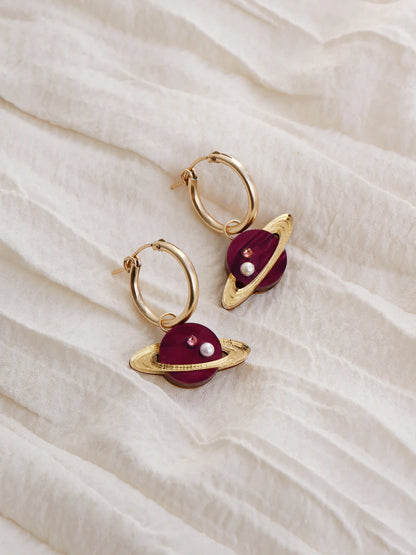 Saturn gold filled Hoops in gold and Cherry acrylic by wolf and moon
