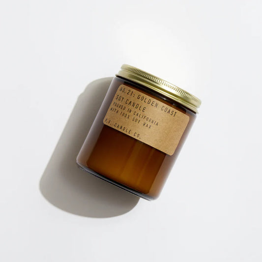 Golden Coast 7.2 oz  Soy Candle, hand-poured into apothecary-inspired amber jars with signature kraft label and a brass lid, by PF Candle Co. 