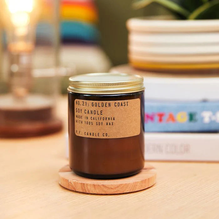 Golden Coast 7.2 oz  Soy Candle, hand-poured into apothecary-inspired amber jars with signature kraft label and a brass lid, by PF Candle Co. 