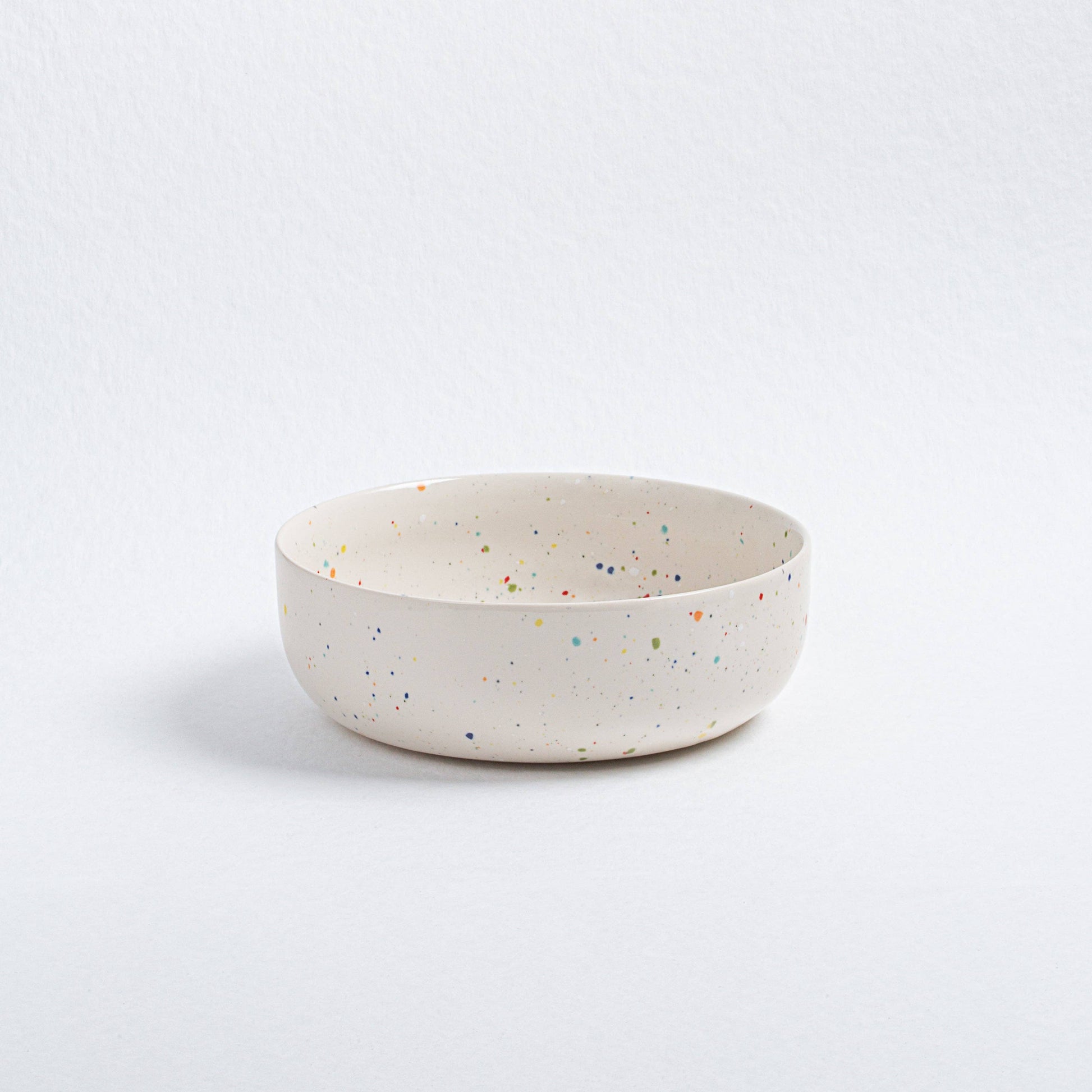 The Every Space white, handmade ceramic Party bowls by Egg Back Home, are handmade in Portugal