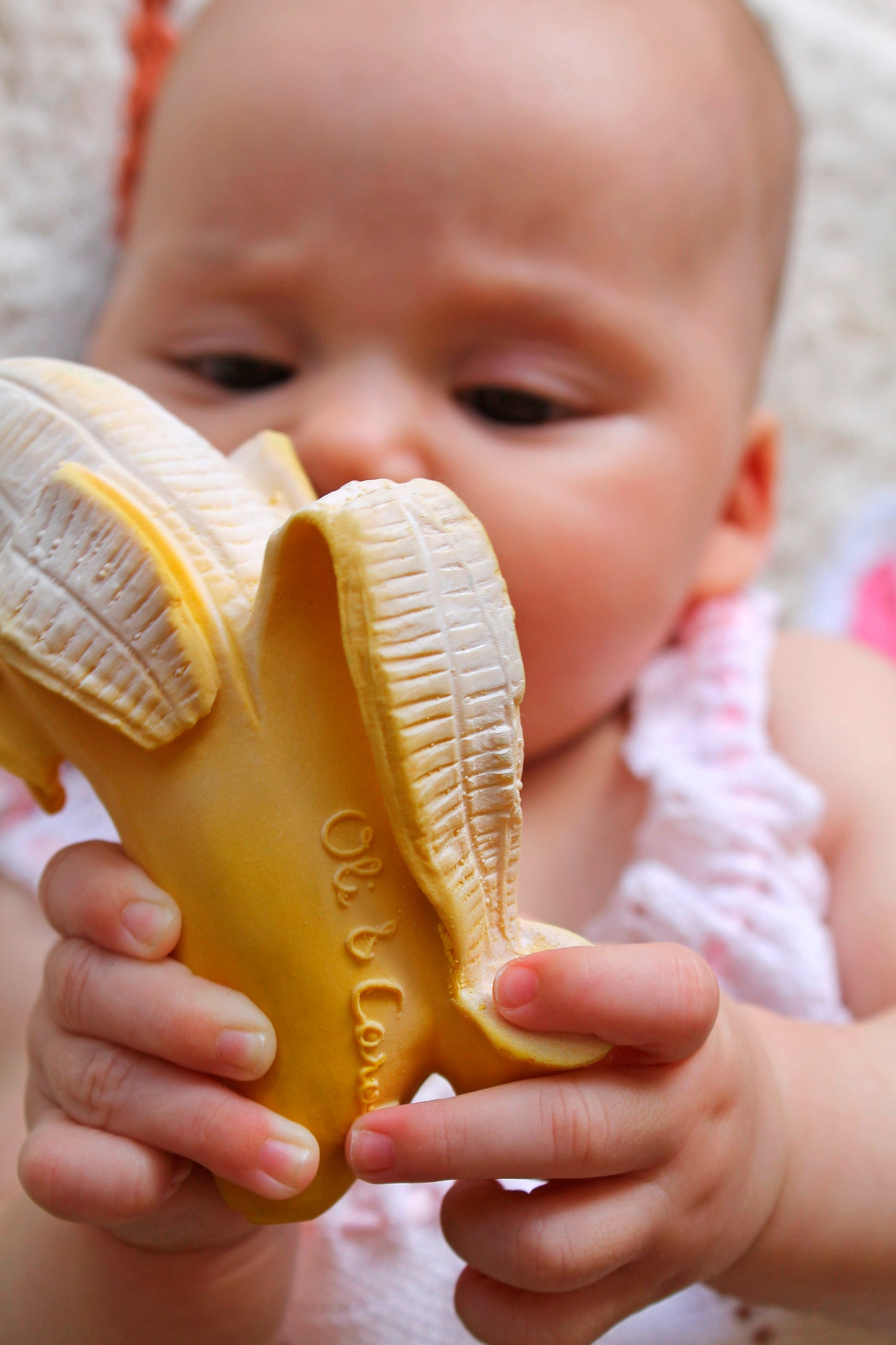 The Every Space Ana Banana natural rubber chewable teether by Oli & Carol