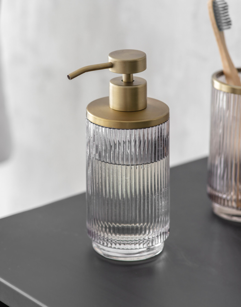 The Every Space Adelphi Soap Dispenser with smoked glass body and brass details by Garden Trading Co.