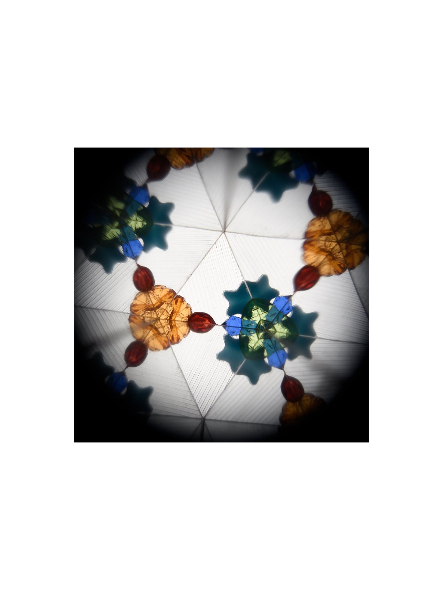 The Every Space Astronomy Kaleidoscope in blue with moon and star decoration by Rex London