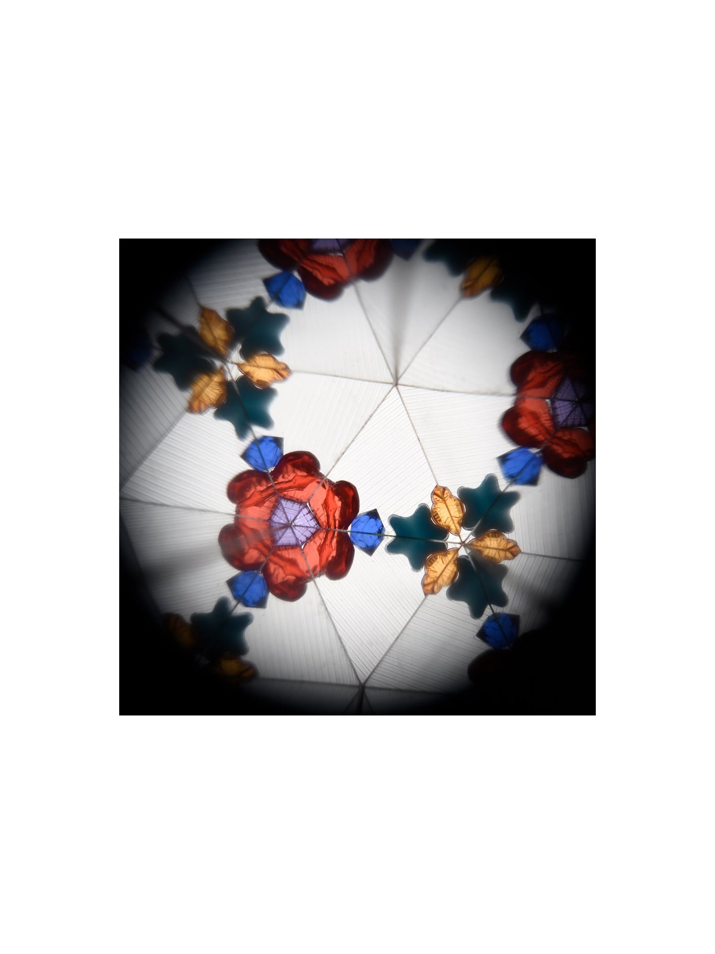 The Every Space Astronomy Kaleidoscope in blue with moon and star decoration by Rex London