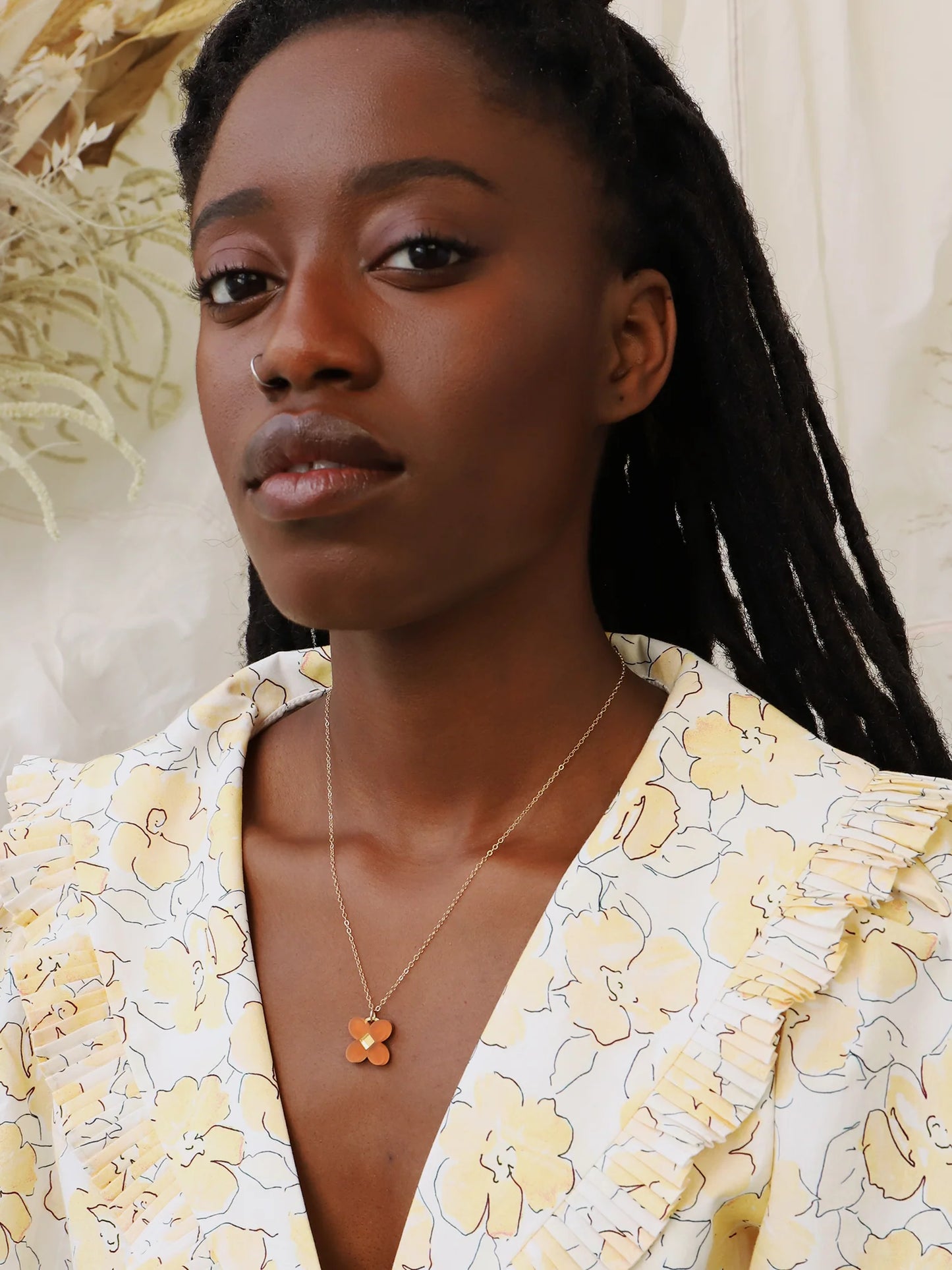 The Every Space Bella necklace with filled gold chain and terracotta acrylic pendant by Wolf & Moon
