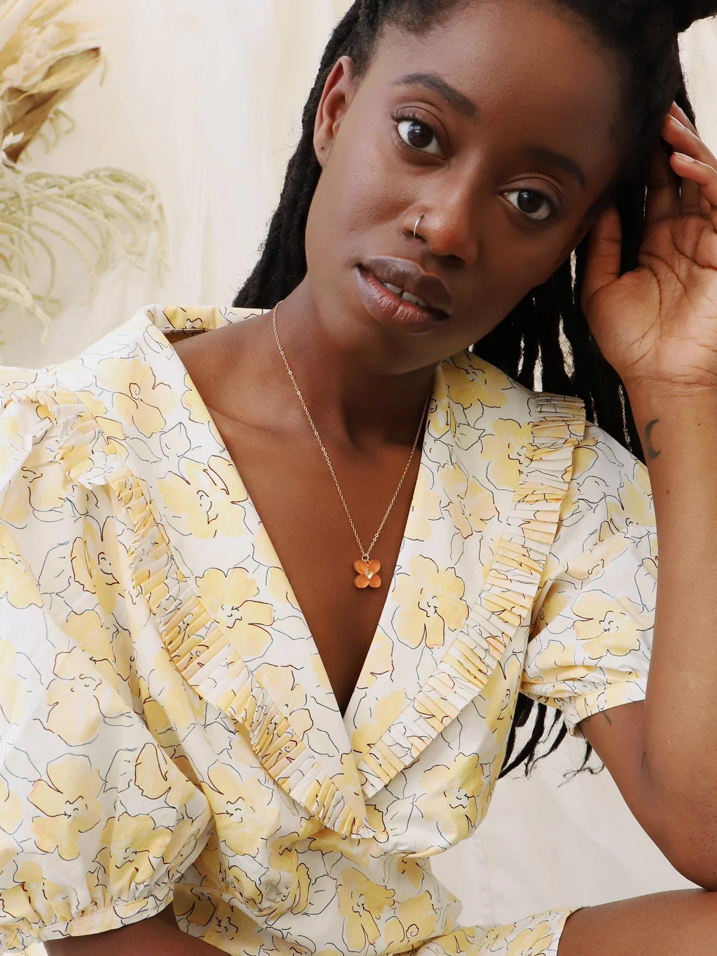 The Every Space Bella necklace with filled gold chain and terracotta acrylic pendant by Wolf & Moon