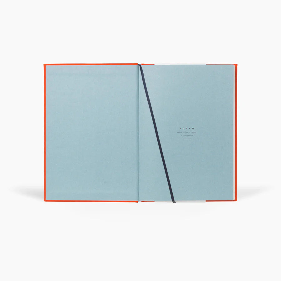 The Every Space medium Even Notebook in bright red cloth hardcover with 160 lined pages by Notem