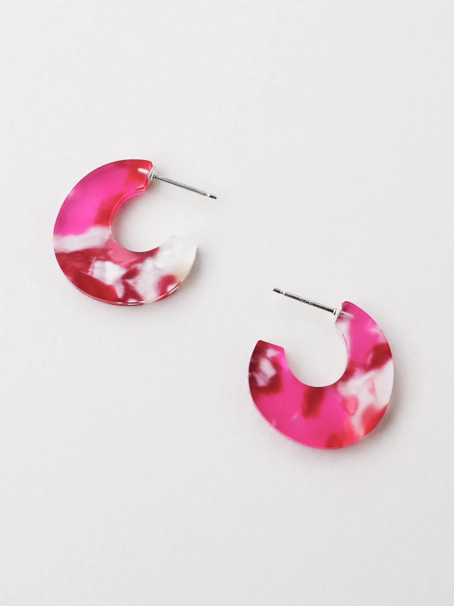 The Every Space Cassia hoop earrings in sterling silver and raspberry acrylic by Wolf & Moon
