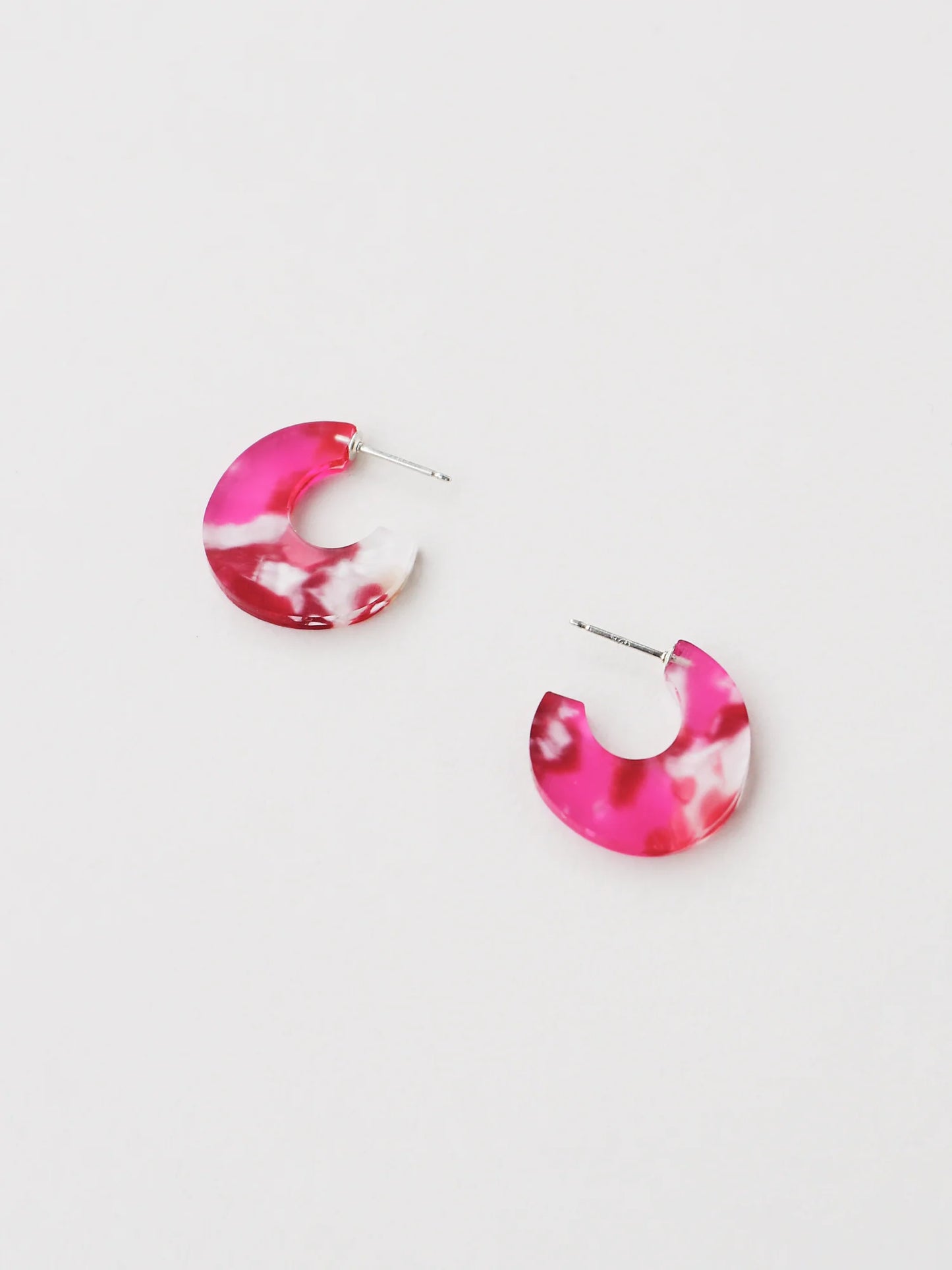 The Every Space Cassia hoop earrings in sterling silver and raspberry acrylic by Wolf & Moon