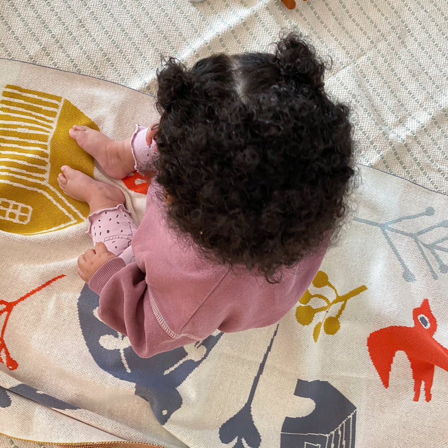 The Every Space folk style Forest Multi-colour baby blanket in 100% cotton for cot or pram by Sophie Home