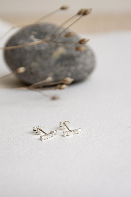 The Every Space Nerth bar stud earrings in sterling silver by Clare Elizabeth Kilgour