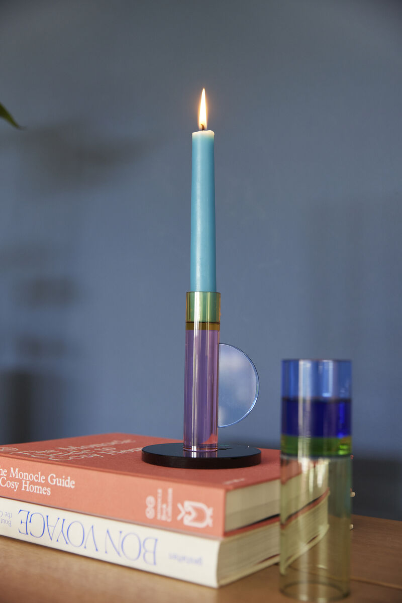 The Every Space Astro candle holder in pink, yellow, blue, and green crystal glass by Hübsch