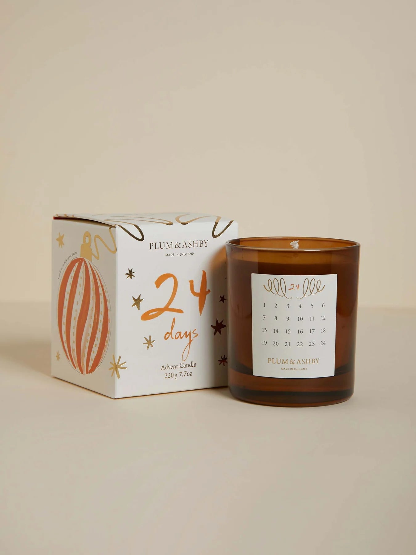The Every Space Cedarwood and Pine Needle seasonal advent candle by Plum & Ashby presented in a gift box with detachable Christmas decoration