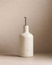 Party white speckled stoneware oil and vinegar dispenser, further view