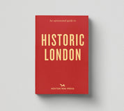 Red book titled 'An Opinionated Guide to Historic London' by Hoxton Mini Press on a gray background
