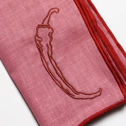 Chilli napkins styled on a laid table