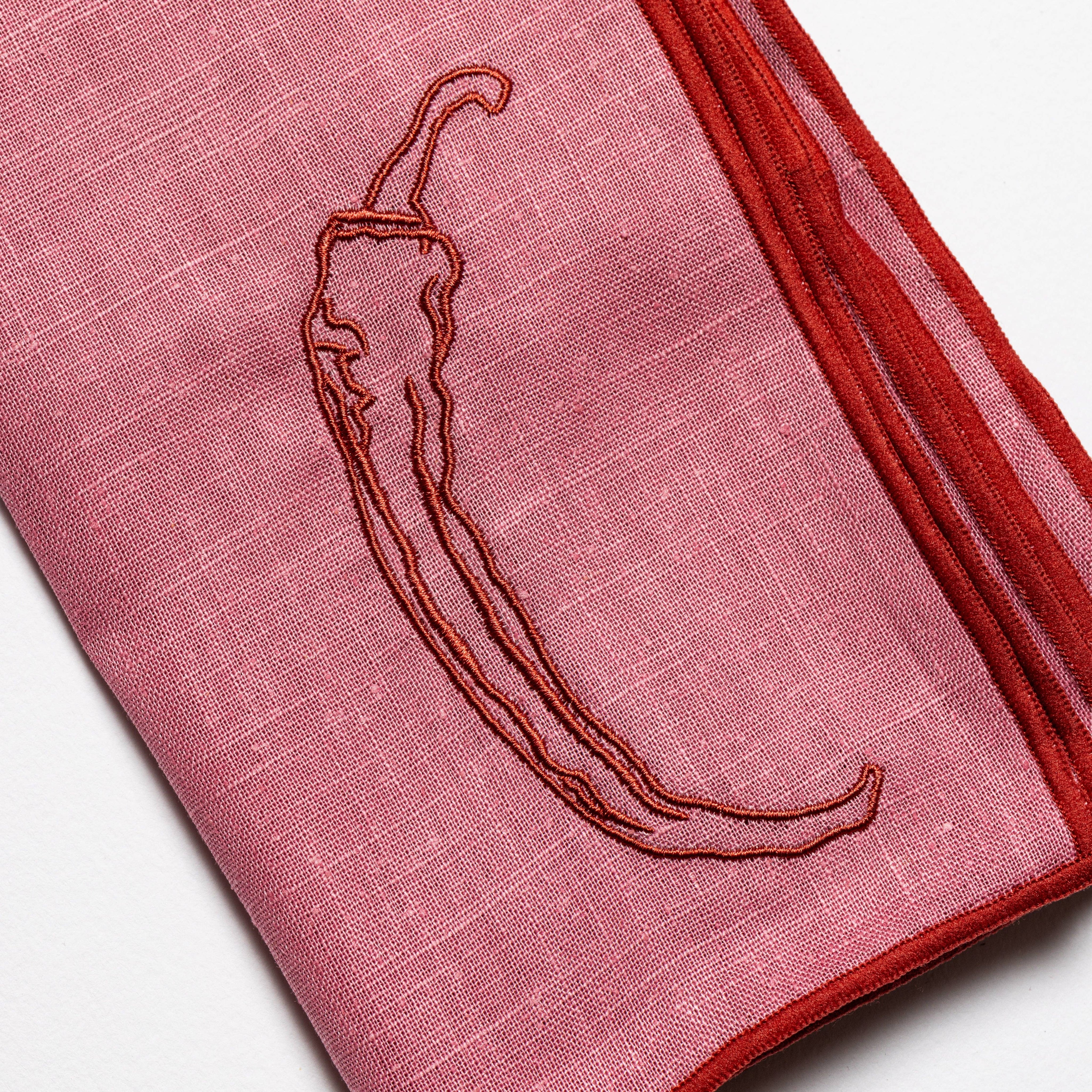 Chilli napkins styled on a laid table