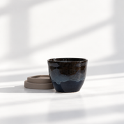 Ceramic flat white cup in Manhattan, further view