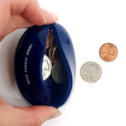 Book Money coin pouch held to show its size