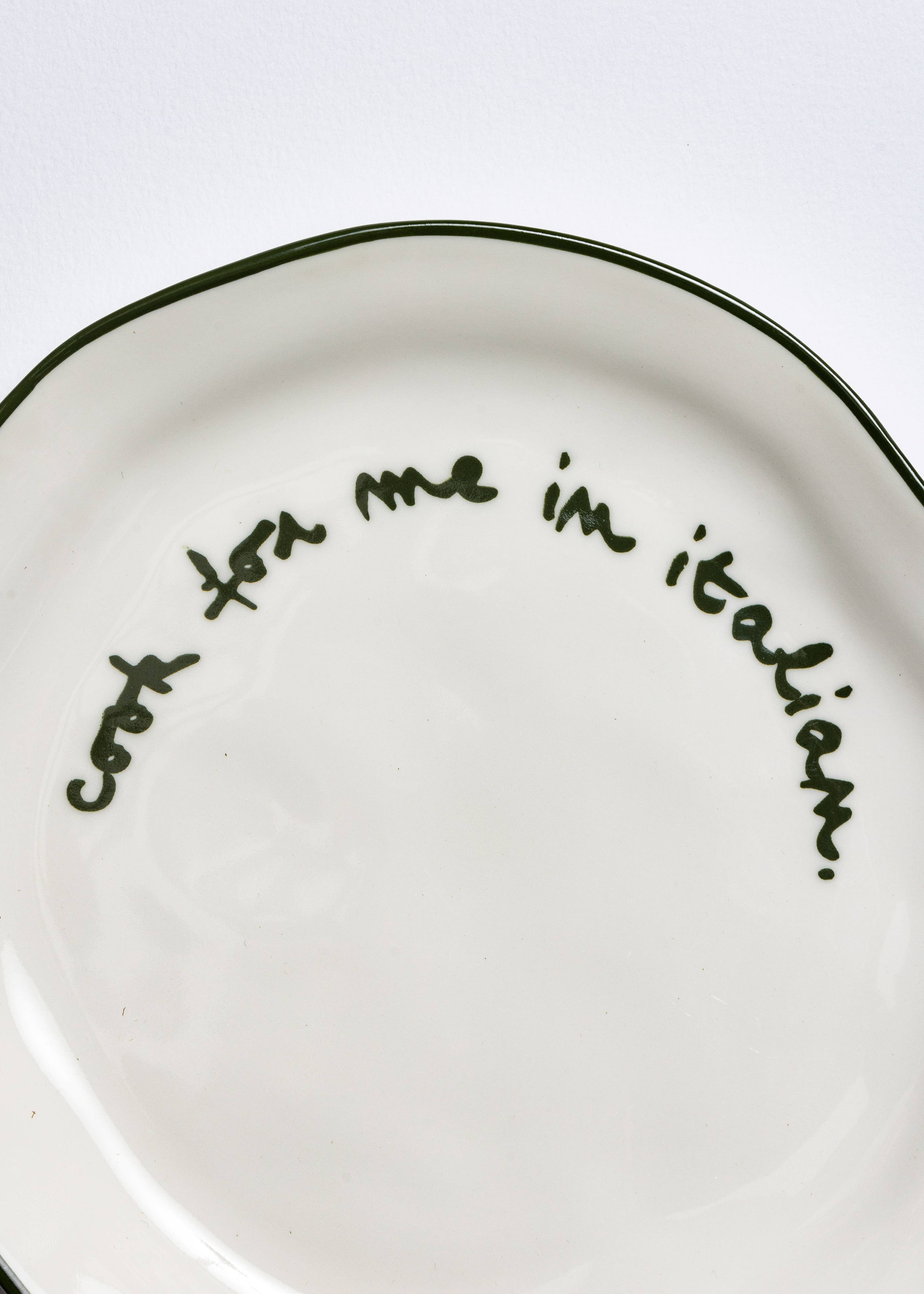 Close up of the lettering on the Cook for me in Italian plate