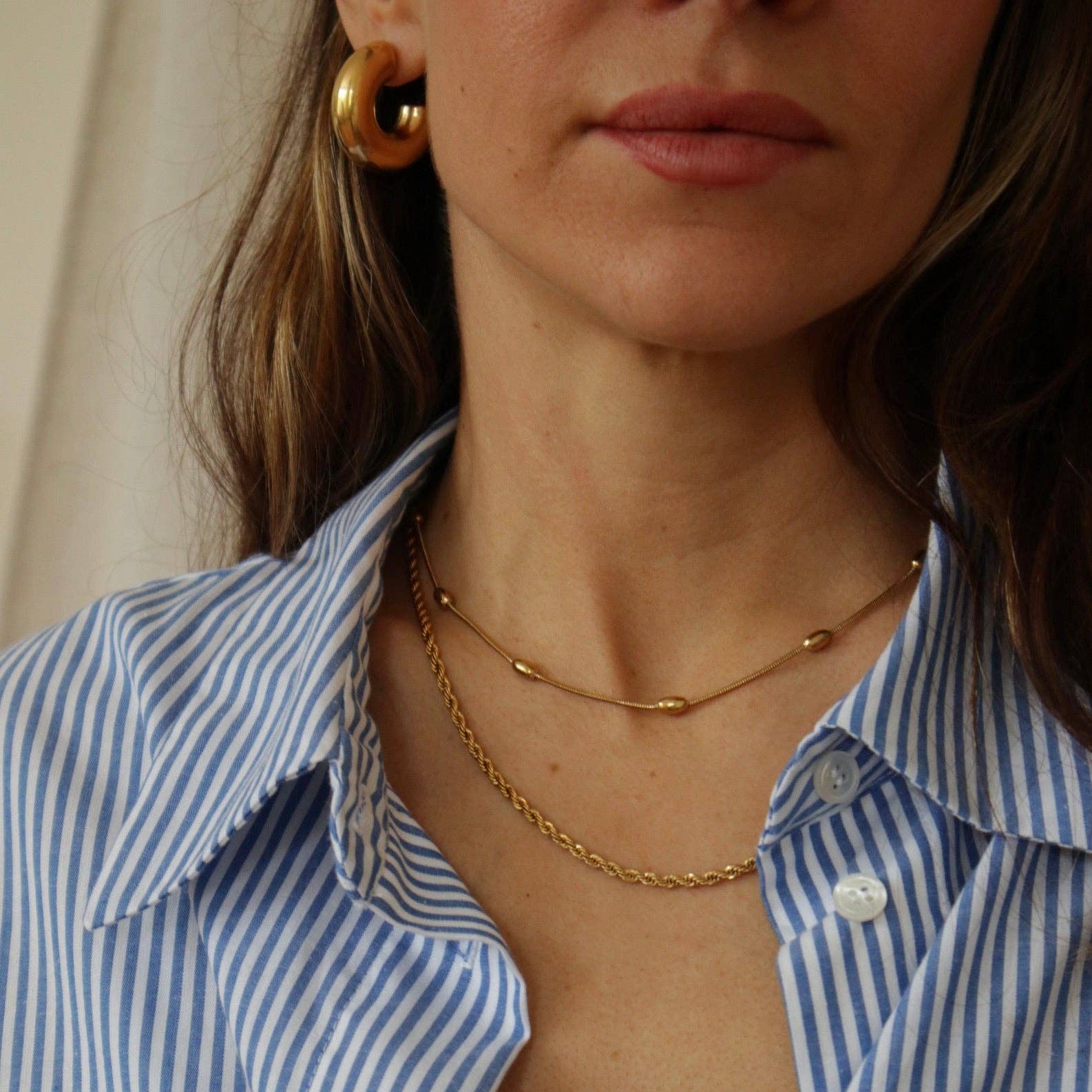 And Danu small Tern hoop earrings, further view