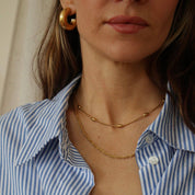 And Danu small Tern hoop earrings, further view