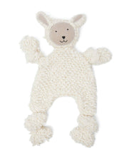 White knitted baby comfort blanket with a bear face design on a white background