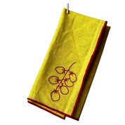 Linen blend napkins with embroidered vine tomatoes in a MÆGEN sleeve