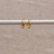 Gold Laurel Huggie Hoops by Little Nell, further view