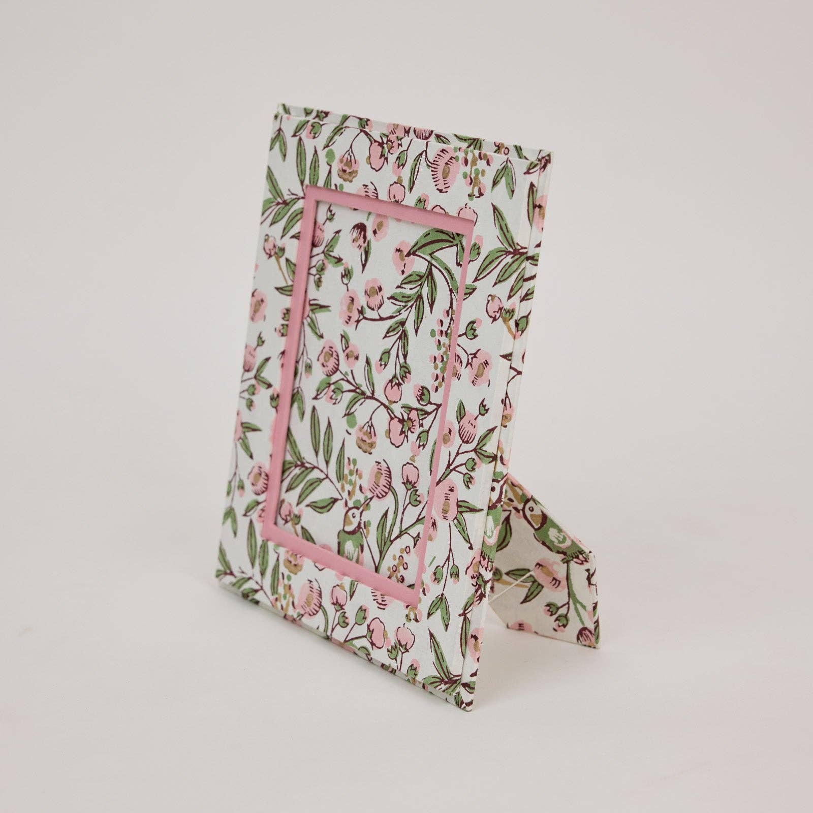 Floral patterned picture frame made from recycled cotton paper, on a white background