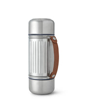 Stainless steel thermos with brown handle on a white background
