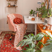 The Nazar Woven Blanket in Peach