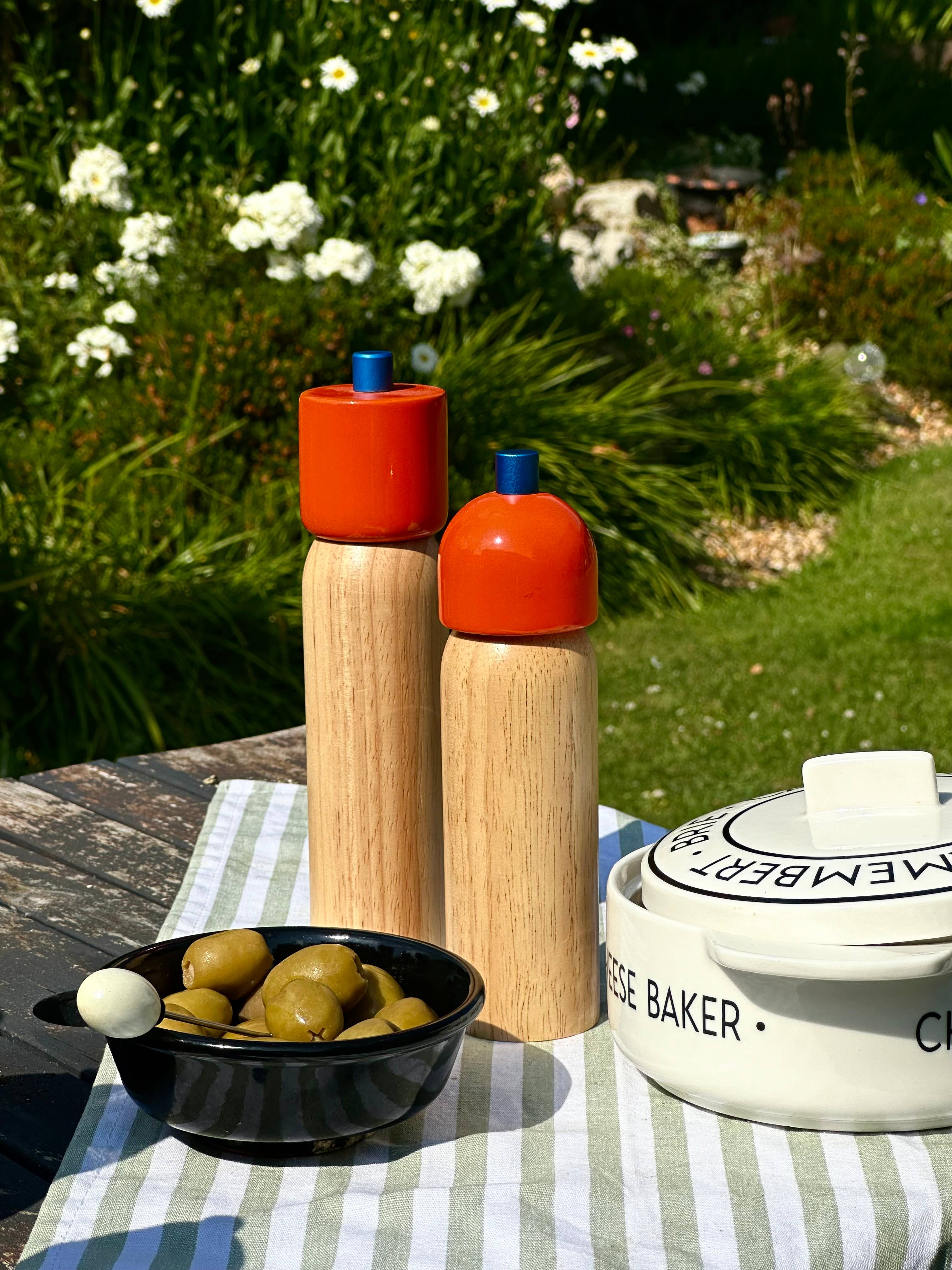 Orange and blue salt and pepper grinder, further view