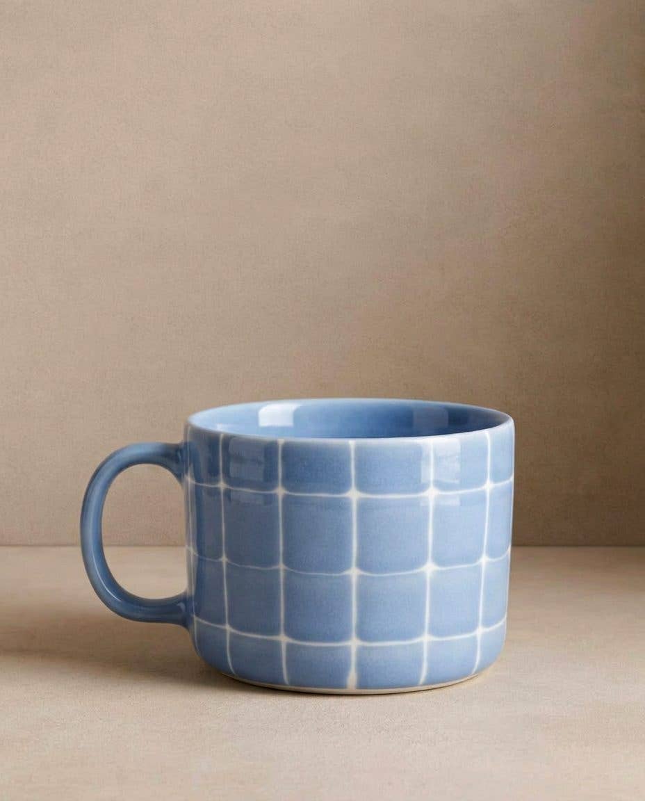 Egg Back Home  handmade blue ceramic mug with grid pattern